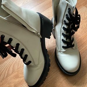 A New Day combat boots. White and black. Size 9. Very one trend and comfortable.